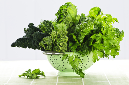 Dark green leafy vegetables in colander